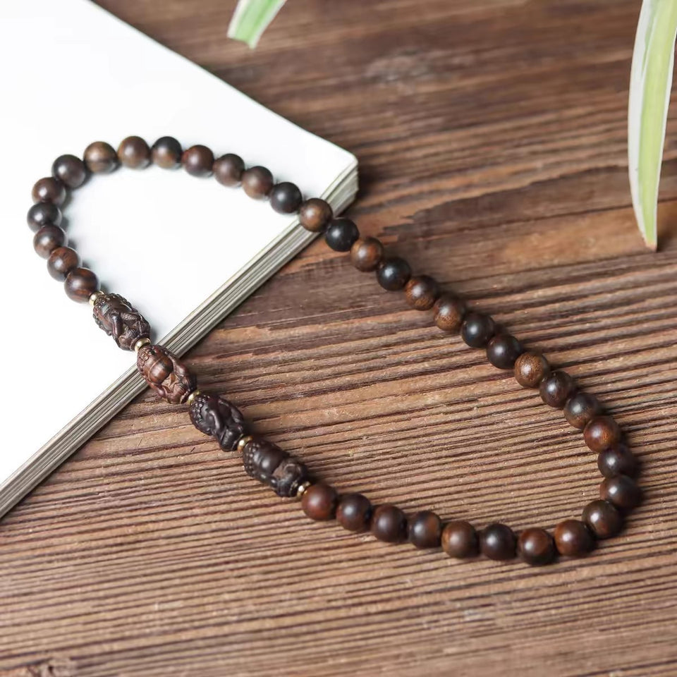 Serenity Men Bracelet With Four Buddha Carved From Agarwood